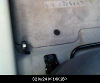 Крепление родного водительского коврика.