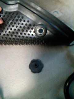 Крепление родного водительского коврика.